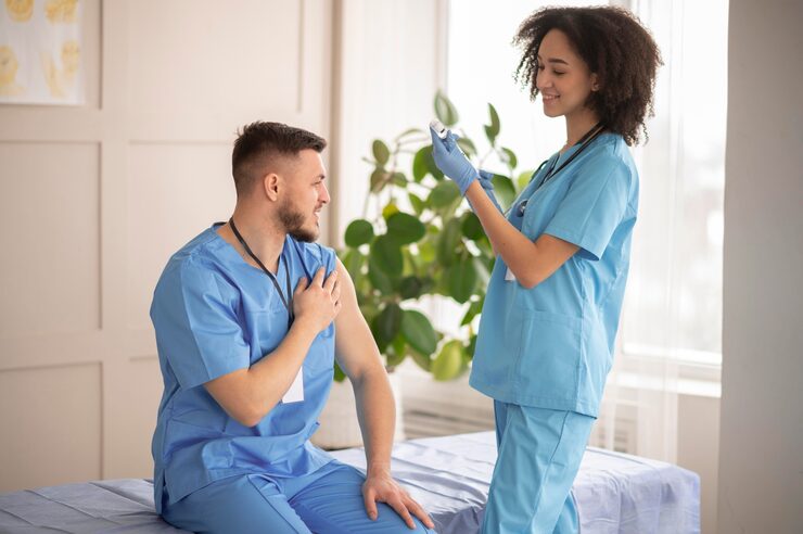 female doctor preparing vaccination her colleague 23 2148880489